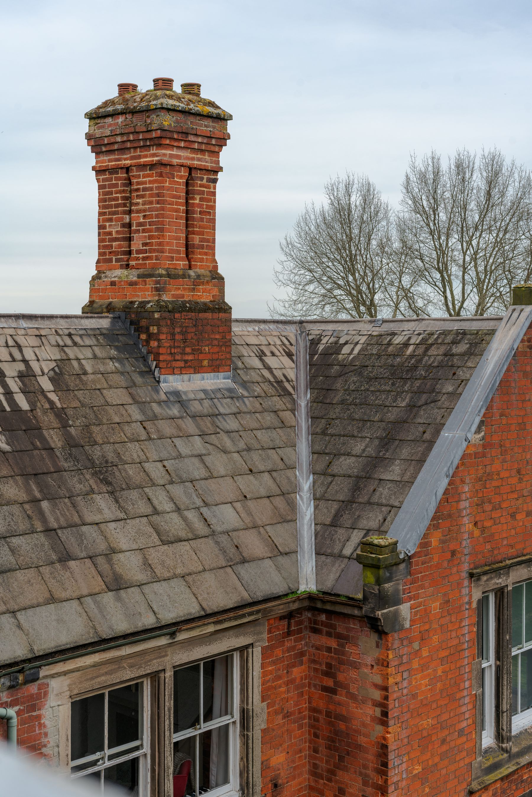 Slate roof and brick chimney — stock photograph